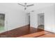 Sunlit bedroom offers a ceiling fan, patio door, and ensuite bathroom with shower at 11260 N 92Nd St # 1060, Scottsdale, AZ 85260