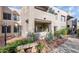 Exterior of a condo building featuring desert landscaping, and an outdoor bench at 11260 N 92Nd St # 1060, Scottsdale, AZ 85260