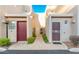 Facade of condo building with multiple front doors and desert landscaping at 11260 N 92Nd St # 1060, Scottsdale, AZ 85260
