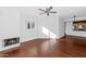 Bright living room with wood floors, fireplace, and open floor plan at 11260 N 92Nd St # 1060, Scottsdale, AZ 85260