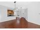 Bright living room with wood floors and decorative lighting that flows into the kitchen at 11260 N 92Nd St # 1060, Scottsdale, AZ 85260