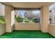 View from the outdoor covered patio to the community landscape with plants and walking path at 11260 N 92Nd St # 1060, Scottsdale, AZ 85260