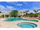 Resort-style community pool and spa with lounge chairs and mature landscaping at 11260 N 92Nd St # 1060, Scottsdale, AZ 85260