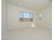Bedroom featuring large windows and plush carpet at 1254 E Penedes Dr, Gilbert, AZ 85298