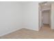 Bedroom with neutral walls and light wood look floors at 1254 E Penedes Dr, Gilbert, AZ 85298