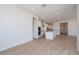 Bright, spacious kitchen featuring white cabinets, stainless steel appliances, and island at 1254 E Penedes Dr, Gilbert, AZ 85298