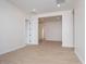 Living room with neutral walls and light wood look floors at 1254 E Penedes Dr, Gilbert, AZ 85298