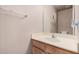 Well-lit half bathroom with a single sink vanity, perfect for guests and everyday convenience at 12574 W Desert Rose Rd, Avondale, AZ 85392