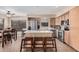 Well-equipped kitchen with stainless steel appliances and an island for meal prep, offering both style and functionality at 12574 W Desert Rose Rd, Avondale, AZ 85392