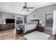 Spacious primary bedroom with a ceiling fan, complemented by natural light for a serene retreat at 12574 W Desert Rose Rd, Avondale, AZ 85392