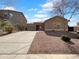 Charming single-story home featuring well-maintained landscaping, concrete driveway, and a welcoming facade at 1321 E Pedro Rd, Phoenix, AZ 85042