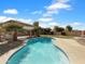 Inviting backyard pool featuring a well-maintained pool, desert landscaping and pergola covered seating area at 1321 E Pedro Rd, Phoenix, AZ 85042