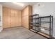 Garage featuring wall to wall cabinets and shelving at 13344 W Via Caballo Blanco --, Peoria, AZ 85383