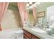 Elegant bathroom with a tub and a vanity at 1365 N El Dorado Dr, Chandler, AZ 85224