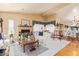 Cozy living room with fireplace, hardwood floors, neutral walls, and traditional-style decor at 1365 N El Dorado Dr, Chandler, AZ 85224