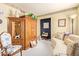 Comfortable living room with a beautiful built-in wooden cabinet and neutral decor at 1365 N El Dorado Dr, Chandler, AZ 85224