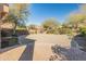 Large backyard with a paver patio, perfect for outdoor entertaining and relaxation at 13672 W Chaparosa Way, Peoria, AZ 85383
