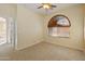 Bright bedroom with carpet, neutral walls, window with blinds, and a ceiling fan at 13672 W Chaparosa Way, Peoria, AZ 85383