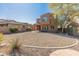 Charming two-story home featuring desert landscaping with shade trees at 13672 W Chaparosa Way, Peoria, AZ 85383