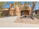 Inviting two-story home boasting a well-maintained yard, neutral stucco, and an attached two-car garage at 13672 W Chaparosa Way, Peoria, AZ 85383