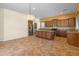 Spacious kitchen with a granite island, stainless appliances, and ample counter space at 13672 W Chaparosa Way, Peoria, AZ 85383