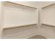 Well-organized walk-in closet with ample shelving and hanging space, maximizing storage at 13672 W Chaparosa Way, Peoria, AZ 85383
