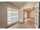 Living room showcasing windows and French doors with outdoor access at 1410 W Berridge Ln, Phoenix, AZ 85013