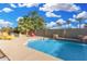 Inviting pool area with ample patio space, ideal for enjoying sunny days and outdoor gatherings at 14527 W Sheridan St, Goodyear, AZ 85395