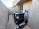 View of the home's air conditioning unit, located outside the home at 1606 E Cactus Wren Dr, Phoenix, AZ 85020