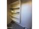 View of a storage closet with multiple shelves at 1606 E Cactus Wren Dr, Phoenix, AZ 85020