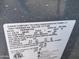 Close up shot of the home's HVAC label showing key technical details and model number at 1606 E Cactus Wren Dr, Phoenix, AZ 85020