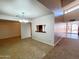 Bright living room featuring a chandelier and view to another room at 1606 E Cactus Wren Dr, Phoenix, AZ 85020