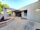 This home has a back patio with brick, rock and concrete landscaping at 1606 E Cactus Wren Dr, Phoenix, AZ 85020