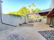 This home has a back patio with brick, rock and concrete landscaping at 1606 E Cactus Wren Dr, Phoenix, AZ 85020