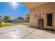 Covered patio offering a seamless transition to the outdoor living space with pool views at 16671 W Mckinley St, Goodyear, AZ 85338