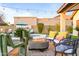 Inviting backyard with a fire pit, cozy seating, and a refreshing pool for outdoor relaxation at 17614 N 56Th Way, Scottsdale, AZ 85254