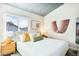 Comfortable bedroom with stylish decor, patterned ceiling and a full size bed at 17614 N 56Th Way, Scottsdale, AZ 85254