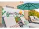 Inviting pool area with a custom 'Desert Wanderer' mural and comfortable lounge chairs at 17614 N 56Th Way, Scottsdale, AZ 85254