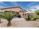 Charming backyard featuring barbeque, covered patio access, and gazebo with outdoor seating at 17938 W Cedarwood Ln, Goodyear, AZ 85338