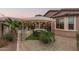 Backyard gazebo with patio furniture, string lights, and lush landscaping for outdoor relaxation at 17938 W Cedarwood Ln, Goodyear, AZ 85338