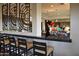 Elegant community bar area with comfortable seating and stylish decor, perfect for gatherings at 17938 W Cedarwood Ln, Goodyear, AZ 85338