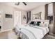 Well-lit bedroom with two twin beds and stylish interior design at 17938 W Cedarwood Ln, Goodyear, AZ 85338