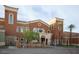 Beautiful village center with well-maintained landscaping and classic architectural details at 17938 W Cedarwood Ln, Goodyear, AZ 85338