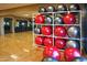 Well-equipped gym area with exercise balls and mirrored walls, promoting a healthy and active lifestyle at 17938 W Cedarwood Ln, Goodyear, AZ 85338