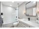 Bright bathroom featuring modern fixtures, glass enclosed shower, and sleek vanity at 1825 N Granite Reef Rd, Scottsdale, AZ 85257