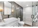 Modern bathroom features a vessel sink, glass-enclosed shower, and stylish herringbone tile accent wall at 1825 N Granite Reef Rd, Scottsdale, AZ 85257