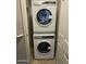 An interior view of a stacked white, front load Electrolux washer and dryer at 1920 E Bell Rd # 1188, Phoenix, AZ 85022