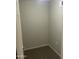 Small walk-in closet with gray walls and carpeted flooring, ready for customized shelving and storage at 1920 E Bell Rd # 1188, Phoenix, AZ 85022