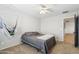 Bedroom with a hanging chair, ceiling fan and wall to wall carpeting at 20916 E Via De Arboles --, Queen Creek, AZ 85142