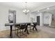 Dining area with a modern chandelier and seating for four people at 20916 E Via De Arboles --, Queen Creek, AZ 85142